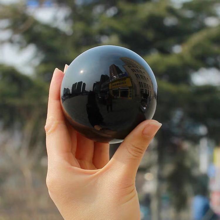 Natural Obsidian Sphere: A Gem of Volcanic Elegance