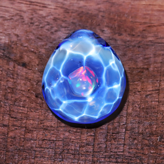 Neptune's Stone: Handcrafted Ocean Glass Pendant by Night Star Glass Art